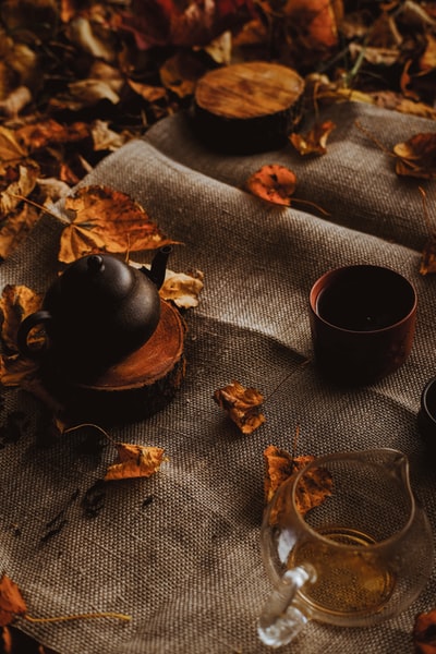 Brown wooden cup mat black ceramic cup
